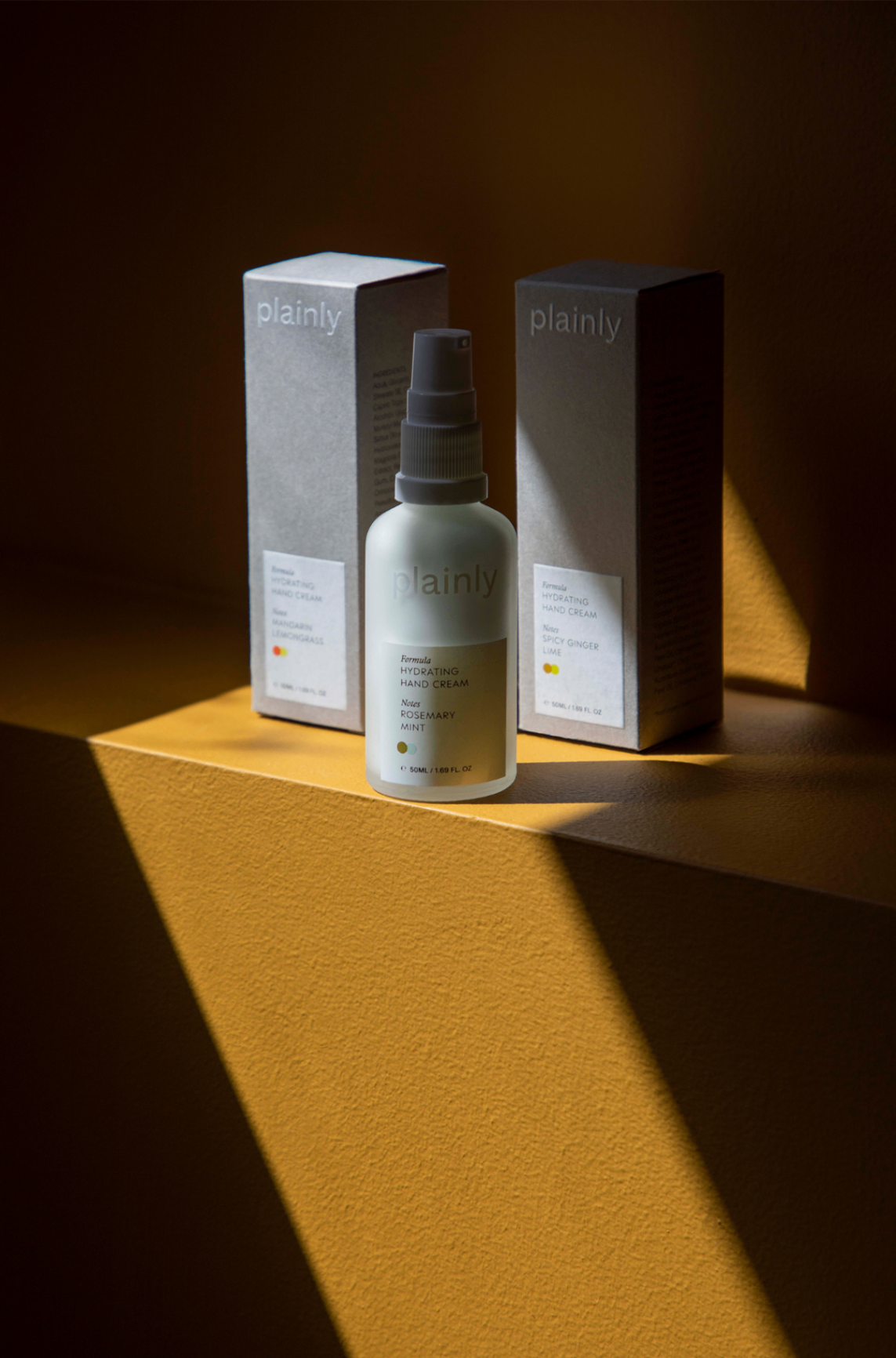 Plainly Hydrating Hand Cream Rosemary Mint in warm sunlight